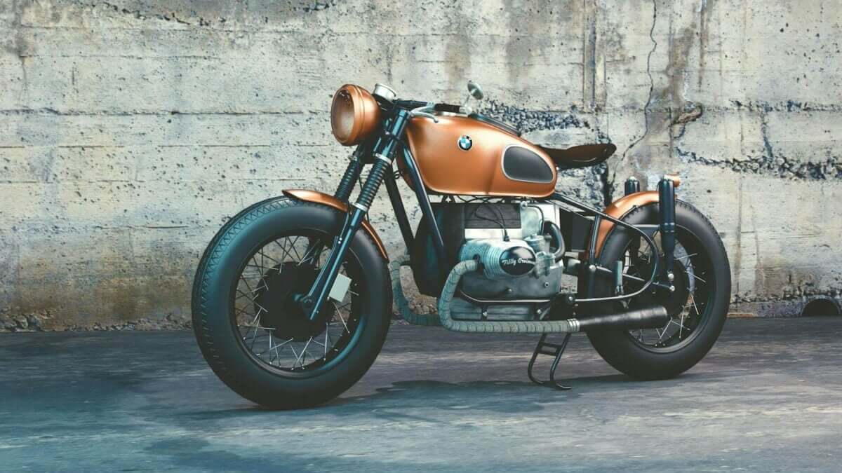 orange and black bmw motorcycle before concrete wall