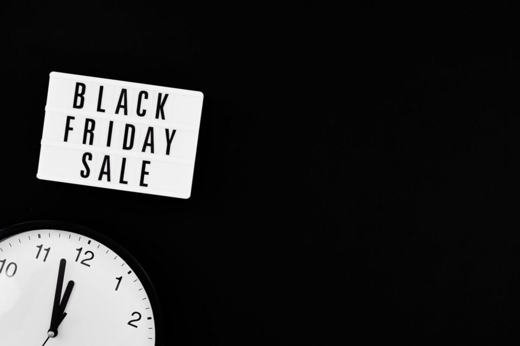 a black friday sale signage on black background